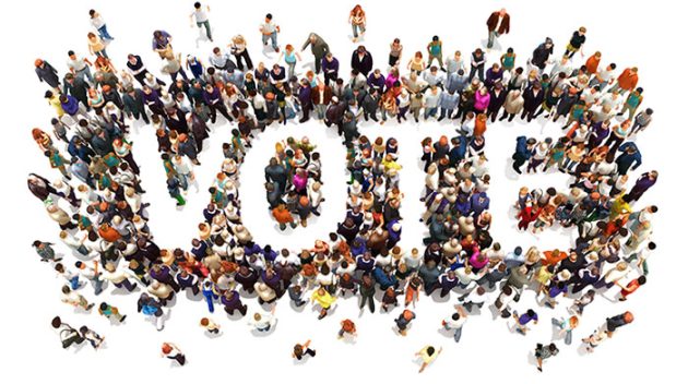 an-arial-view-of-people-forming-the-word-vote an-arial-view-of-people-forming-the-word-vote